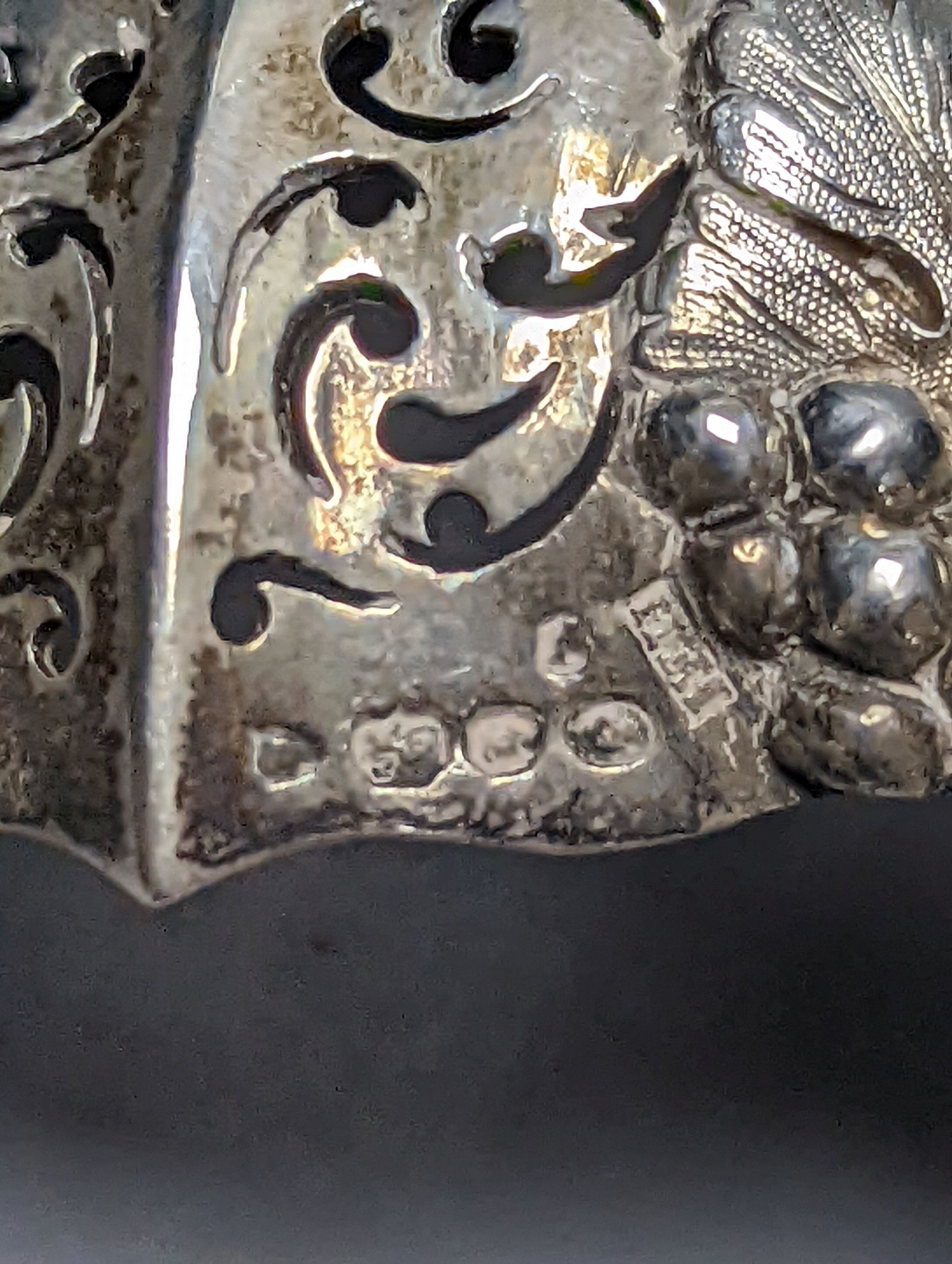 A late 19ty century Russian 84 zolotnik sifter ladle, assay master Ludvig Zug, 187?, 18.7cm, and a Victorian silver sifter spoon with vineous handle, 5oz.